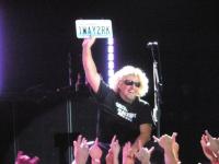 Sammy holding up my license plate!